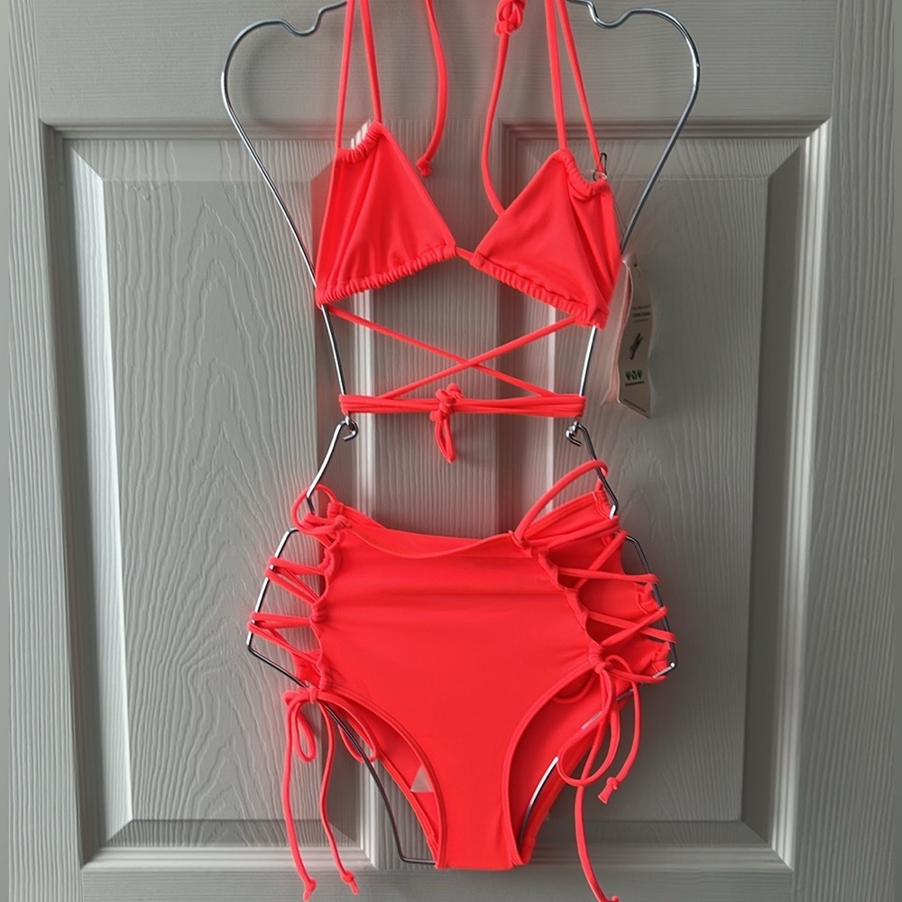 Free People/Anthropologie/Revolve Brand:
WE ARE HAH Swimsuit NEON PINK
